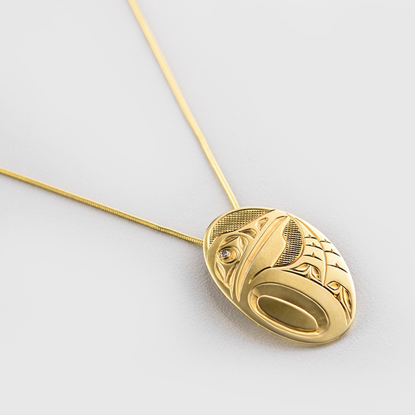 gold raven pendant