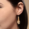 Modelled Gold Spoon Earrings by Northwest Coast native Artist Walter Davidson