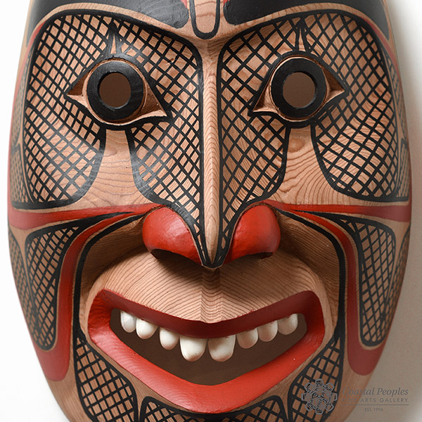Red Cedar wood, Acrylic Paint, Operculum shell Redemption Mask by Northwest Coast artist Corey Moraes