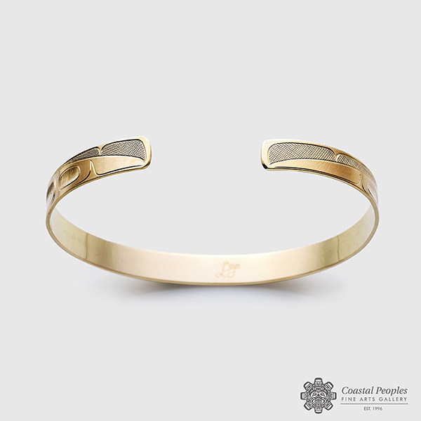 14k gold Raven Bracelet by Canadian indigenous artist Landon Gunn